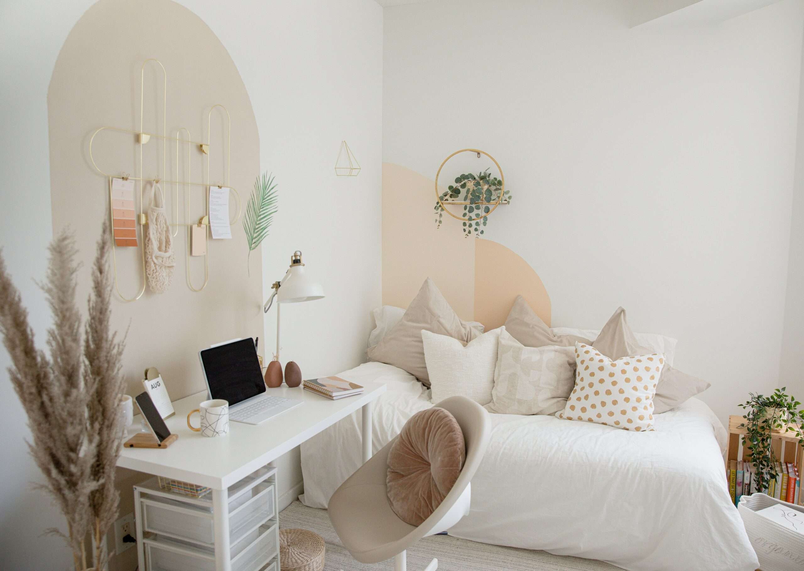a bedroom with a bed and a desk